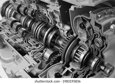 Planetary gears inside automatic transmission  in the context.  Metal mechanism. Steel. Engineering. Heavy industry. Concept - production of metal spare parts. Industrial topics. 