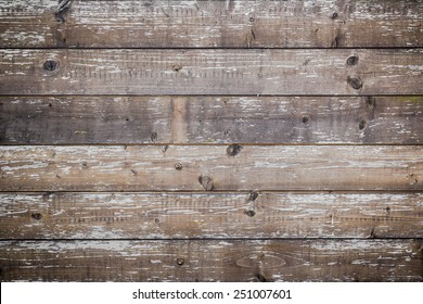 Planks of wood damaged by the aging process.