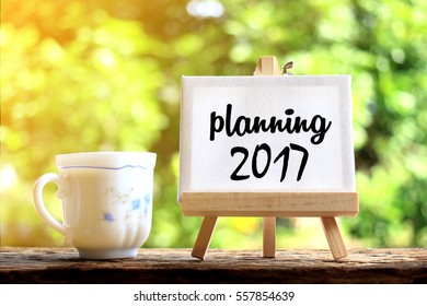 Planning 2017. concept of coffee cup with stand board on morning background - Powered by Shutterstock