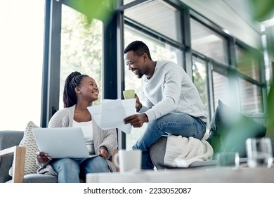 Planning finance budget, banking on laptop or becoming debt free while couple with paperwork look excited, happy or cheerful. Man and woman winning lottery, securing financial home loan and mortgage - Powered by Shutterstock