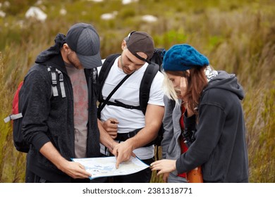 Planning, hiking and friends with a map, travel and direction with health, journey and lost. People, men and women with nature, paper and confused with location, adventure and hike with trekking - Powered by Shutterstock