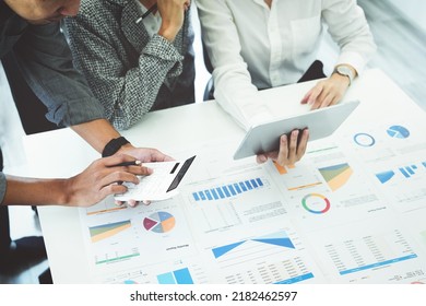 Planning to reduce investment risks, the image of a group of businesspeople working with partners is adjusting marketing strategies to analyze profitable and targeted customer needs at meetings - Shutterstock ID 2182462597