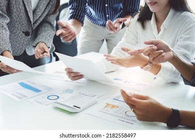 Planning to reduce investment risks, the image of a group of businesspeople working with partners is adjusting marketing strategies to analyze profitable and targeted customer needs at meetings - Shutterstock ID 2182558497