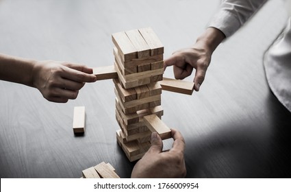 Planning to reduce investment risks, plan and strategy in business, Establishing a business risk mitigation plan to create stability for the company, Business growth with wooden blocks concept. - Shutterstock ID 1766009954