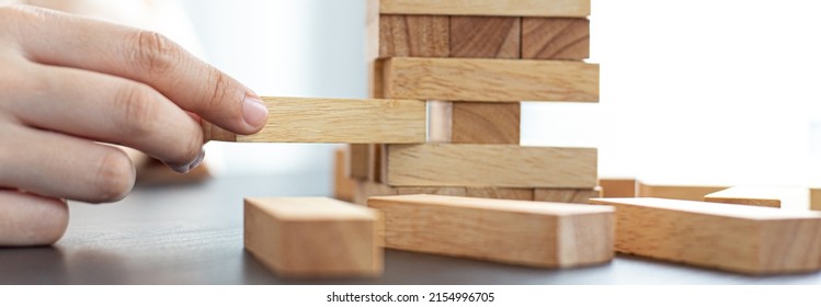 Planning To Reduce Investment Risks, Plan And Strategy In Business, Establishing A Business Risk Mitigation Plan To Create Stability For The Company, Business Growth With Wooden Blocks Concept.