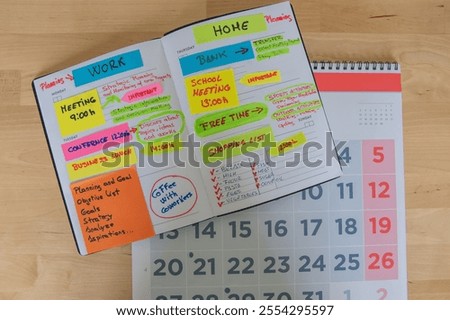 Planning Setup: Open Notebook With Goals And Tasks, Monthly Calendar, And Laptop On Wooden Desk, A Perfect Visual For Productivity, Time Management, Home Office Organization, And Focus
