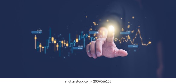 planning and strategy, Stock market, Business growth, progress or success concept. Hand of Businessman or trader touching showing a growing virtual hologram stock on smartphone, invest in trading. - Shutterstock ID 2007066155