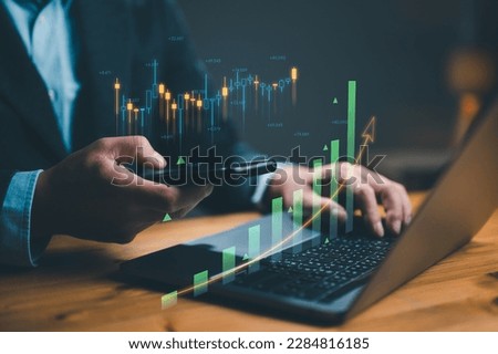 Planning and strategy, Stock market, Business growth, progress or success concept. Businessman or trader is showing a growing virtual hologram stock, invest in trading. Return on stocks mutual funds