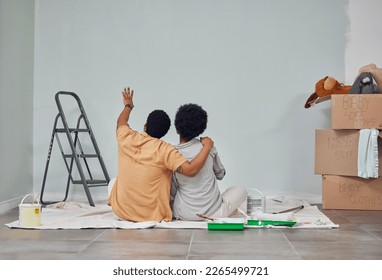 Planning, wall or black couple pointing in home renovation, diy or house remodel together on floor. Back view, painting or African man loves talking or working with teamwork in decoration with woman - Powered by Shutterstock