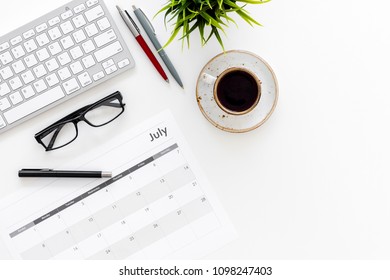 Planning at work. Strategy planning. Business development concept. Set the goals. Calendar on white office desk top view copy space