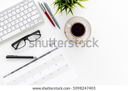 Planning at work. Strategy planning. Business development concept. Set the goals. Calendar on white office desk top view copy space