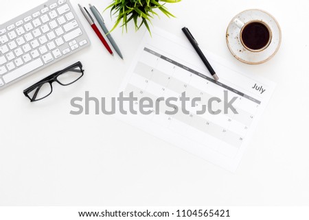 Planning at work. Strategy planning. Business development concept. Set the goals. Calendar on white office desk top view copy space