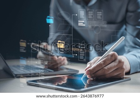 Planning workflow process concept. Flowchart solution implementation. Strategy diagram plan management. Planning business. A man is using a tablet to write on a screen.