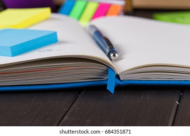 Planning your day, A day blank day planner with a blue pen - Shutterstock ID 684351871
