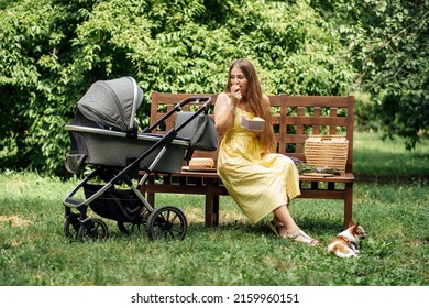 Plans And Diet For Breastfeeding Moms. Allergy In An Infant Child During Breastfeeding The Baby. Young Mom Eating Fruits While Walk With Newborn Baby In Stroller.