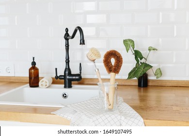 Plant Based Cleaning Brush Set Kitchen white kitchen background. Eco friendly kitchen, zero waste home concept - Powered by Shutterstock