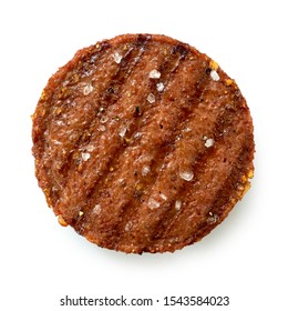 Plant Based Grilled Burger Patty With Grill Marks And Rock Salt Isolated On White. Top View.