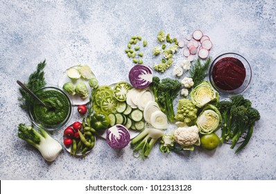 Plant Based Raw Food Vegan Food Cooking Background. Flat-lay Of Fresh Vegetables, Greens, Smoothie Bowl Superfoods O Top View, Copy Space. Clean Eating, Alkaline Diet, Vegetarian Concept