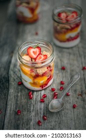 Plant Based Yogurt In A Glass Jar. Mango Strawberry Pudding. Vegan Dessert.