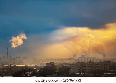The plant emits smoke from the pipes at mist cloudy, pollutants the atmosphere