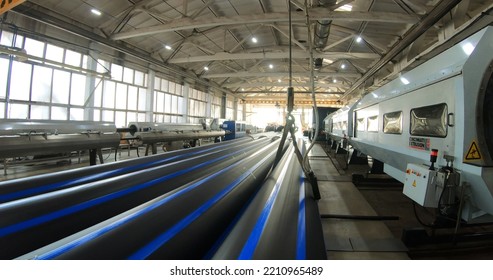 A Plant For The Production Of Plastic Pipes. Production Line For The Manufacture Of Water Pipes. Moscow. Russia-August 20, 2022.