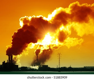 Plant with smoke and blue sky - Shutterstock ID 51883909