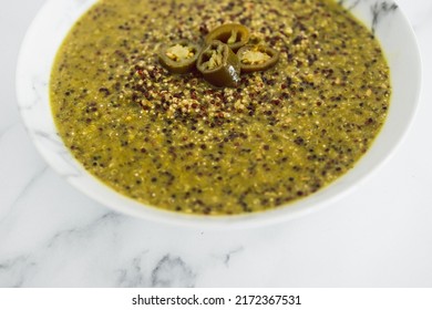 plant-based pesto quinoa with spicy jalapeno peppers, healthy vegan food recipes