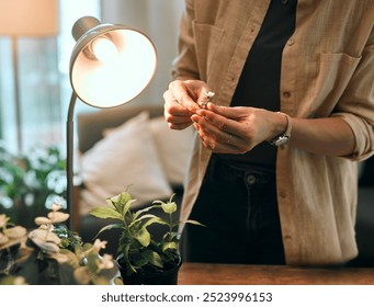 Plants, hands and botany for medical research for botanist, scientist and study in office. Person, science and flowers for academic, education and learning with biotechnology, ecology and nature - Powered by Shutterstock