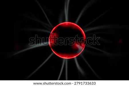 Plasma atom core glows. Electric sphere shows energy. Plasma sparks surround nucleus. Atom core emits light.