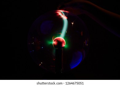 Plasma Ball Lamp Energy, Child Boy Hand Touching Glowing Glass Sphere, Concept For Power, Electricity, Science And Physics