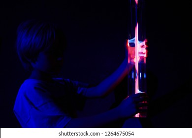 Plasma Ball Lamp Energy, Child Boy Hand Touching Glowing Glass Sphere, Concept For Power, Electricity, Science And Physics