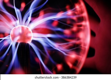 Plasma Ball Lamp Energy, Hand Touching Glowing Glass Sphere Concept For Power, Electricity, Science And Physics