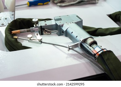 Plasma cutting equipment. Plasma cutter for welding. Plasma cutter on a working metal table. Sale of equipment for plasm cutting something. Device for cutting metal. Metal carving equipment - Powered by Shutterstock