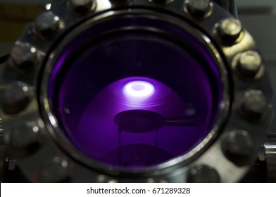 Plasma Generated In Vacuum Chamber.