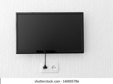 Plasma TV Hanging On Wall