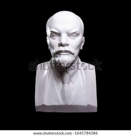 Plaster bust of Lenin on a black background
