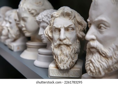 Plaster bust of philosopher Anaximander and group of other busts. Portraits of ancient historical persons. Mass-product souvenir in Turkey. Copy space, selected focus