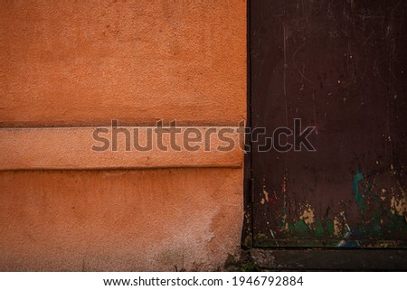 plaster texture of the outer wall of the building, teracotta red texture wall for backgrounds and copy space