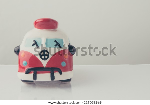Plaster toy car -\
savings bank , vintage\
color