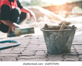 The Plasterer Mixes The Concrete Mixture At The Concrete Cement Construction Site