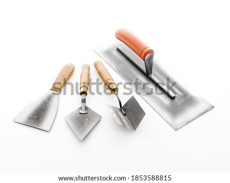 Plasterer's basic tools - stainless steel large trowel, small trowel, corner trowel and scraper on white background