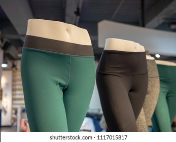 Plastic Athletic Mannequin Lower Bodies Posing With Yoga Pants In A Store