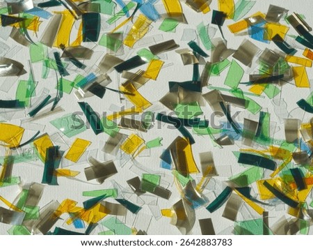 Plastic background. Recycling background. Zero waste. Plastic recovery. Reusable of old plastic. Second life. Recycling, reuse, circular, reprocessing. Colorful pieces of old plastic repurposing.