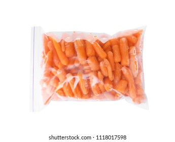 Plastic Bag With Frozen Baby Carrots On White Background, Top View. Vegetable Preservation