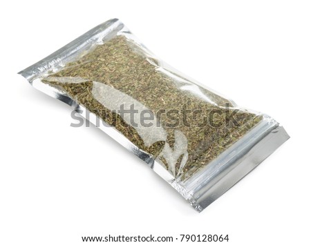 Plastic bag of  herb and spice mix isolated on white