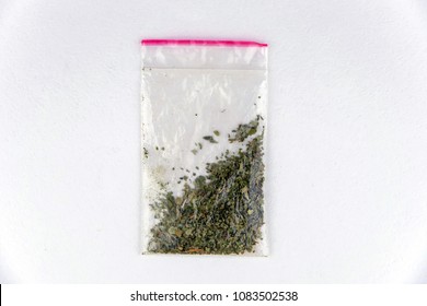 Plastic Bag Of Synthetic Substance, Cannabis, Weed, Marijuana. On White, Top View