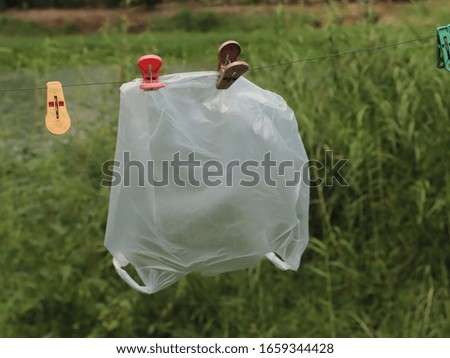 Similar – yellow plastic bag