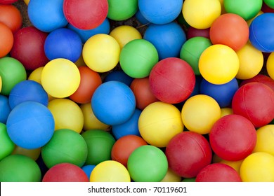 Plastic balls in colors of blue, red, green, yellow and orange