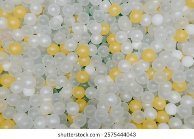 plastic balls for dry pool, view from above, children attraction, white, yellow, pattern, background, texture