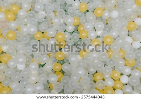 plastic balls for dry pool, view from above, children attraction, white, yellow, pattern, background, texture